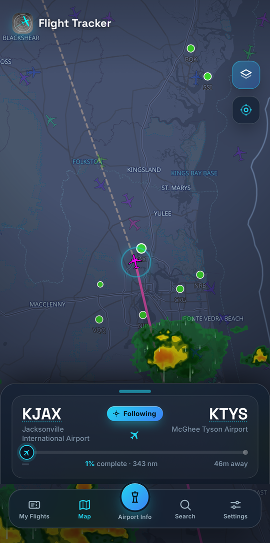 Flight Tracker following a flight from Jacksonville to McGhee Tyson, with a magenta route trail across the map and a progress card showing distance remaining and time to arrival